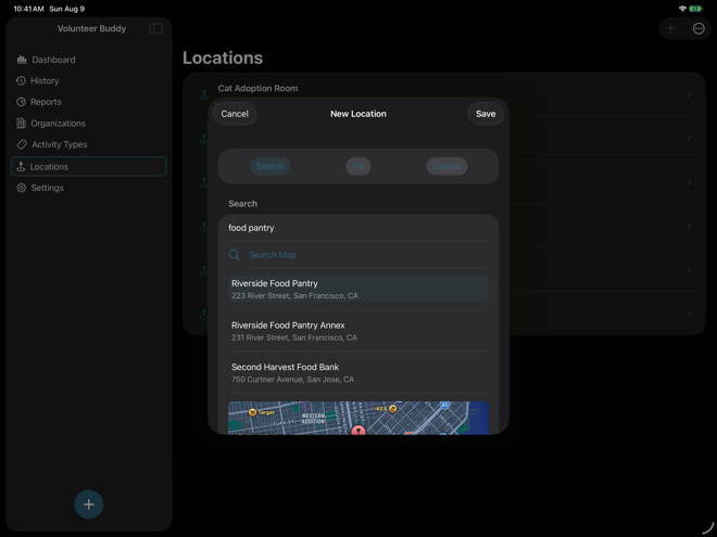 Volunteer Buddy New Location search mode with search text, a results list, a selected result, and a map preview