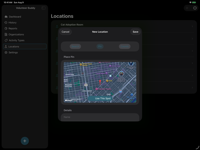 Volunteer Buddy New Location Pin mode on iPad with a center pin and Use This Spot action